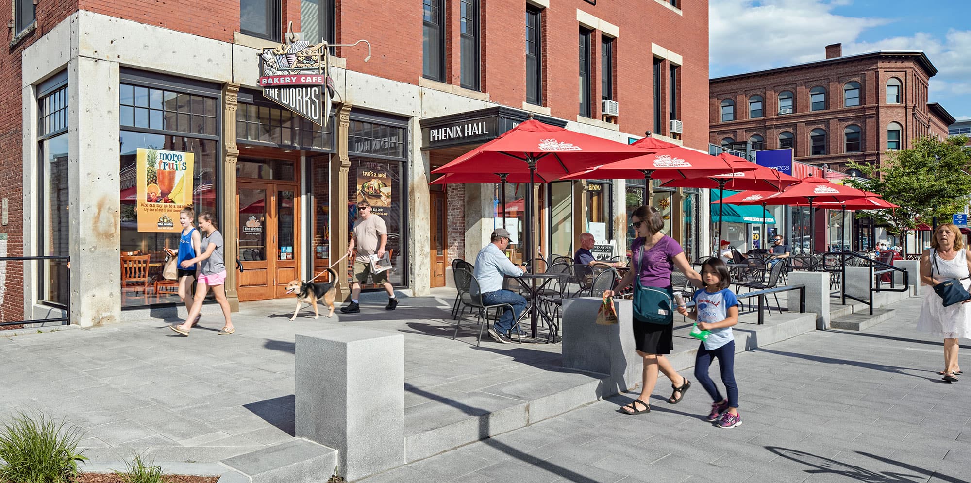 Concord Main Street with restaurants, shops, and sidewalk seating.